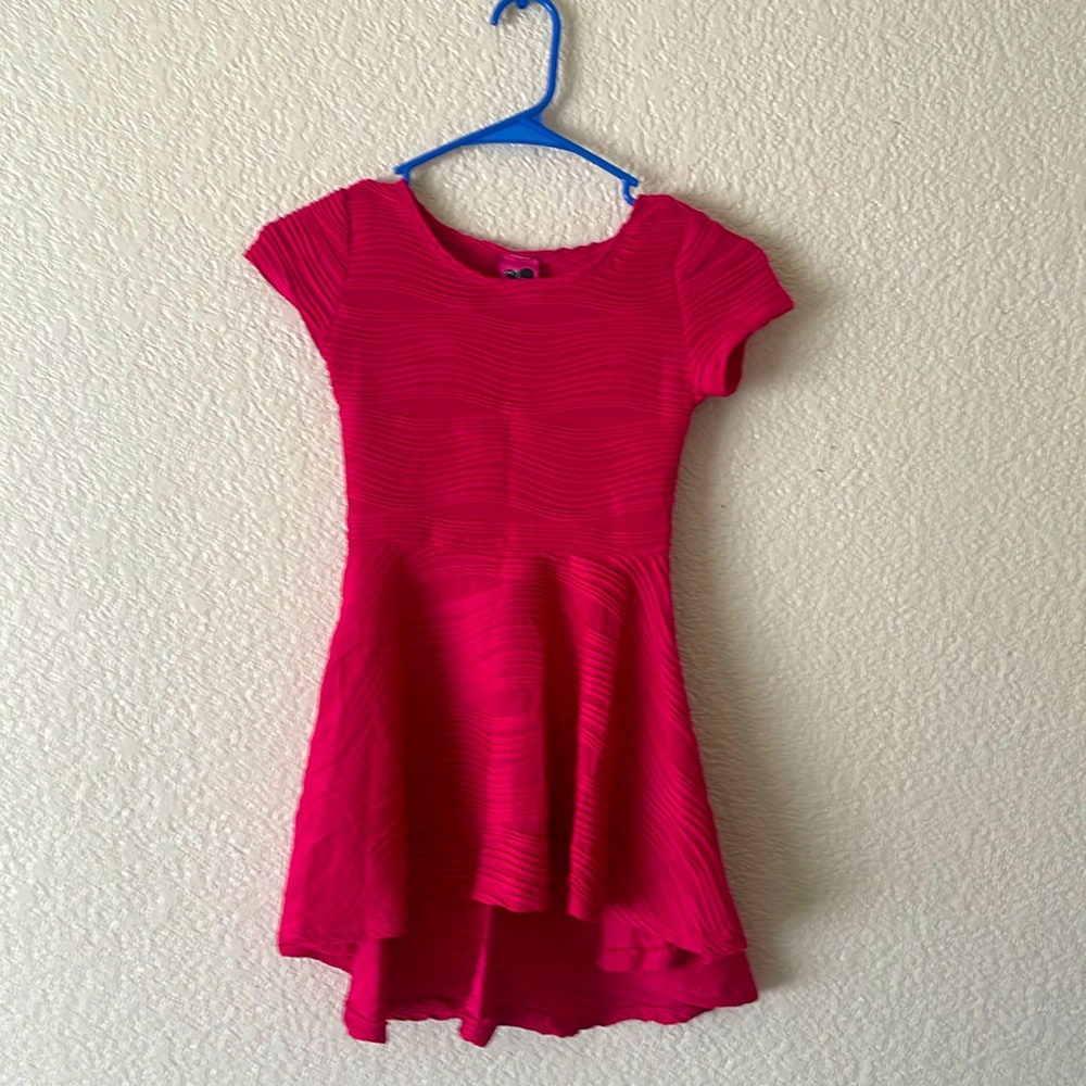 A pleated pink dress
